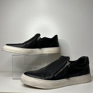 J Slides Black Zipper Style Slip-On Sneakers.